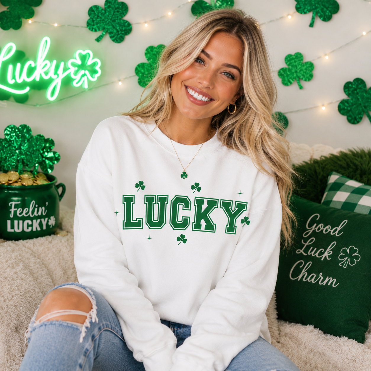 Woman wearing a 'Lucky' sweatshirt in a festive setting with shamrocks and a neon sign.