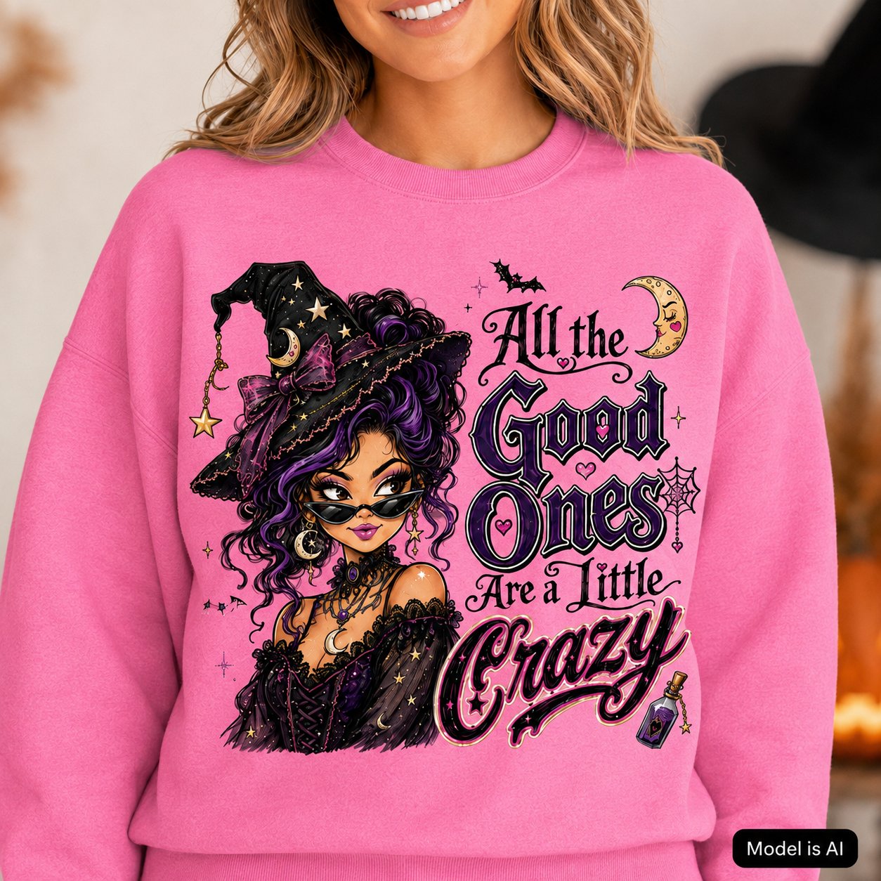 Pink Lemonade Halloween witch sweatshirt with “All the Good Ones Are a Little Crazy” graphic featuring a purple, pink and black witch design.