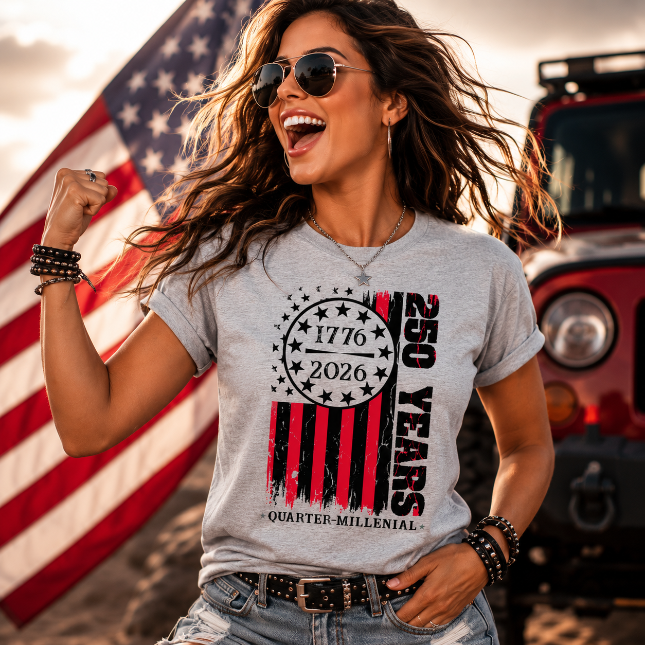 Woman wearing a t-shirt with a 250th anniversary design in front of an American flag and jeep.