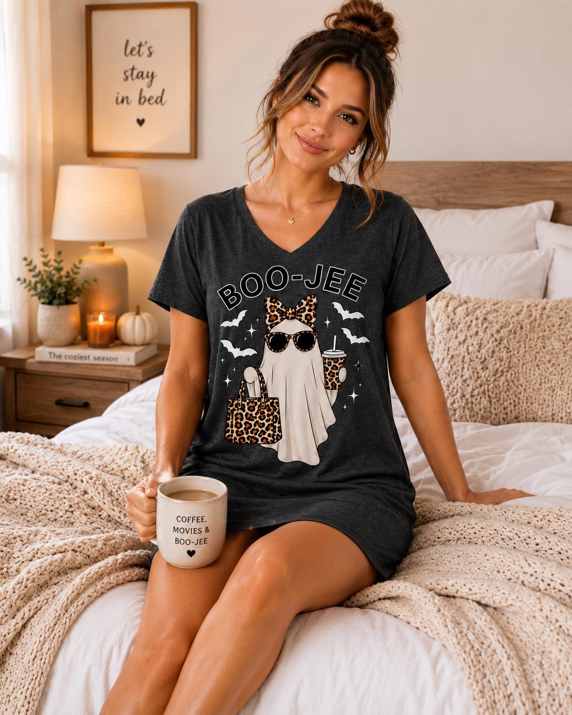 Charcoal BOO-JEE Ghost Halloween Sleep Shirt with leopard print ghost graphic modeled in a cozy bedroom with a coffee mug