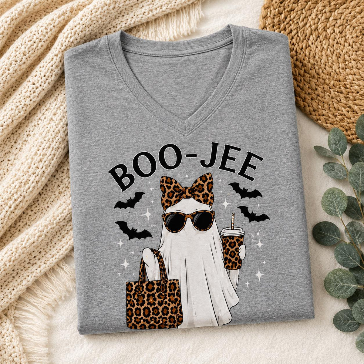 Folded gray BOO-JEE Ghost Halloween Sleep Shirt with leopard print ghost graphic and V-neck design
