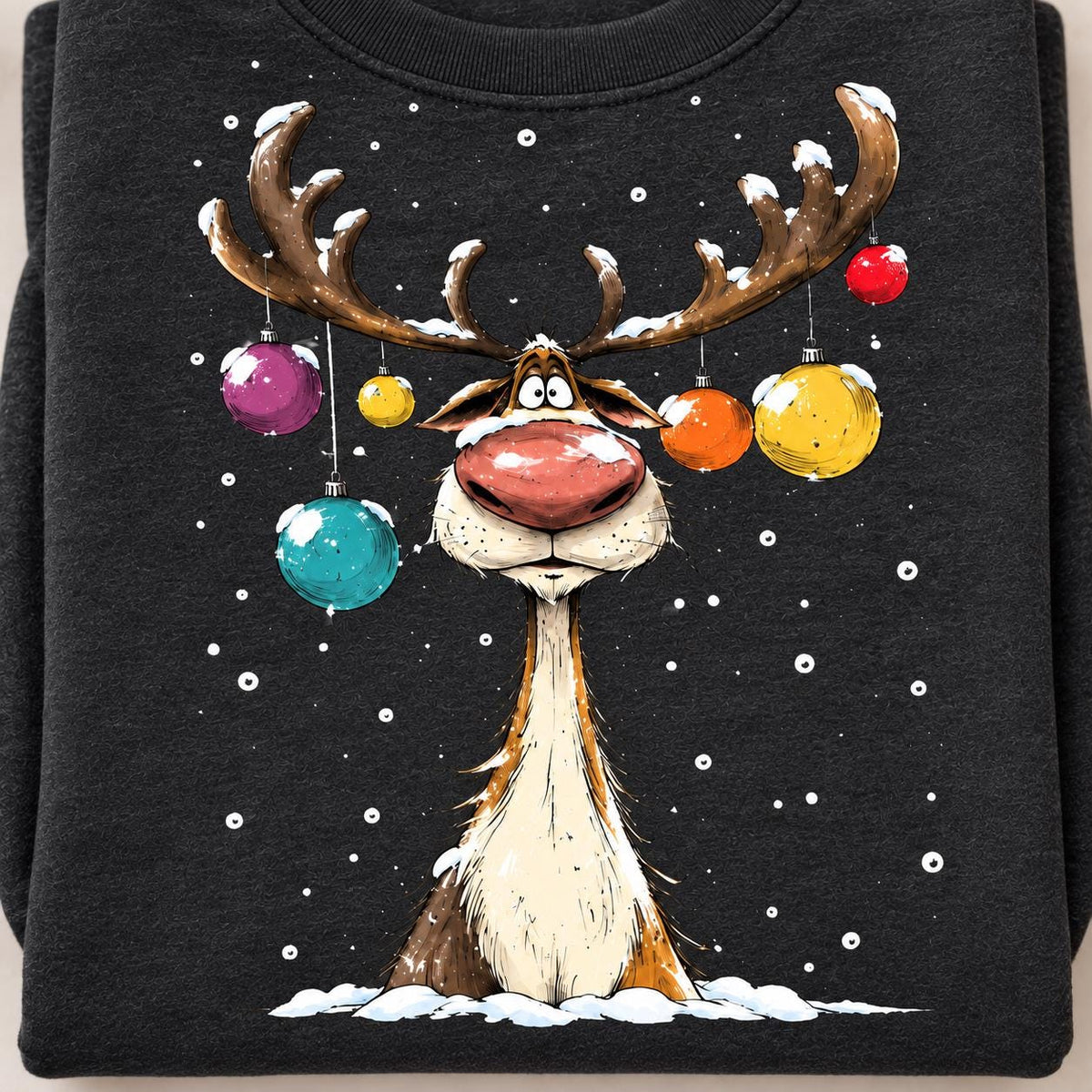 Close-up of the funny ornament reindeer design on a Heather Black sweatshirt.
