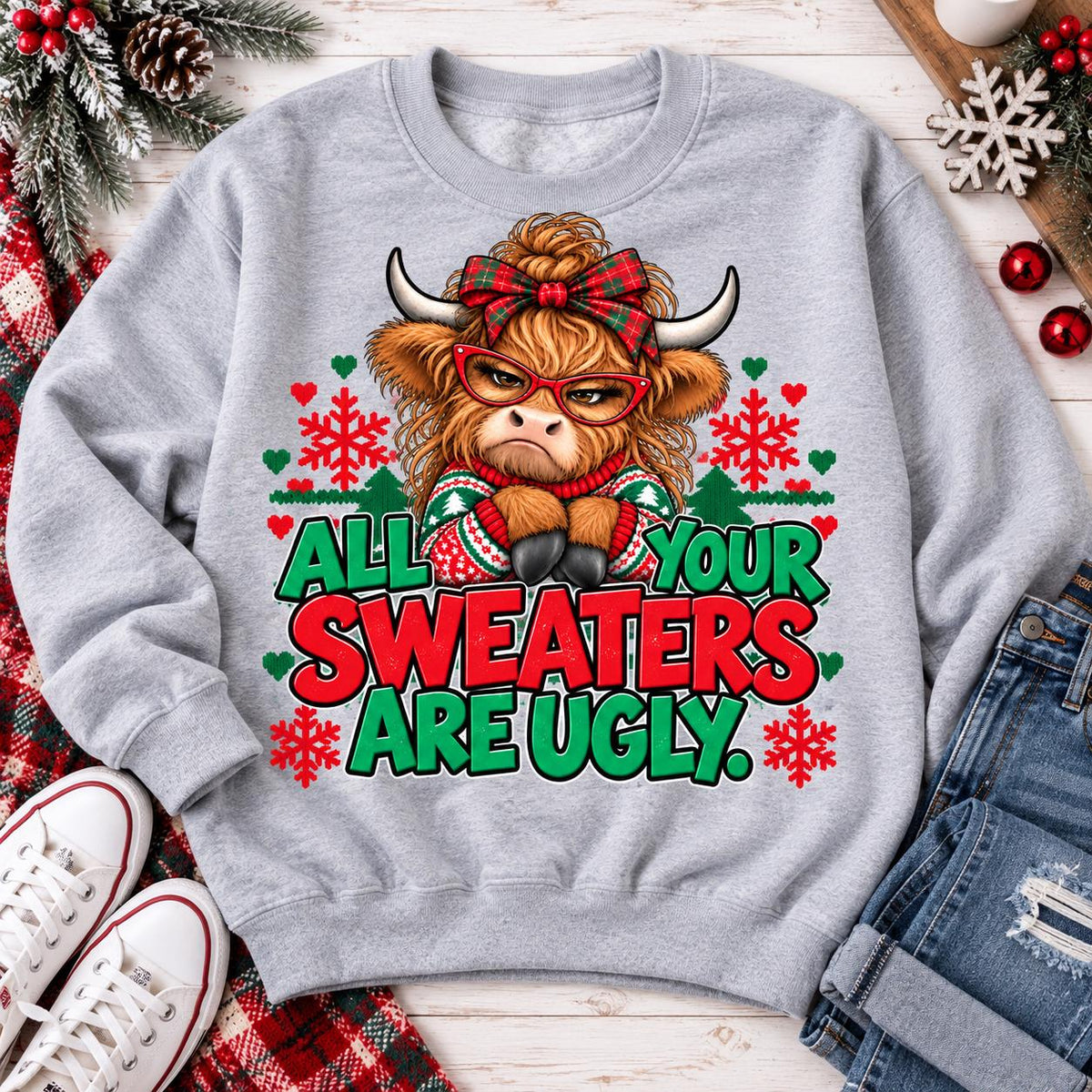 Sport Gray funny Highland cow Christmas sweatshirt laid flat.