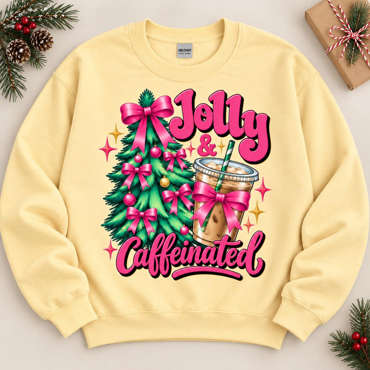Yellow Haze Christmas coffee sweatshirt laid flat with festive pink bow design.