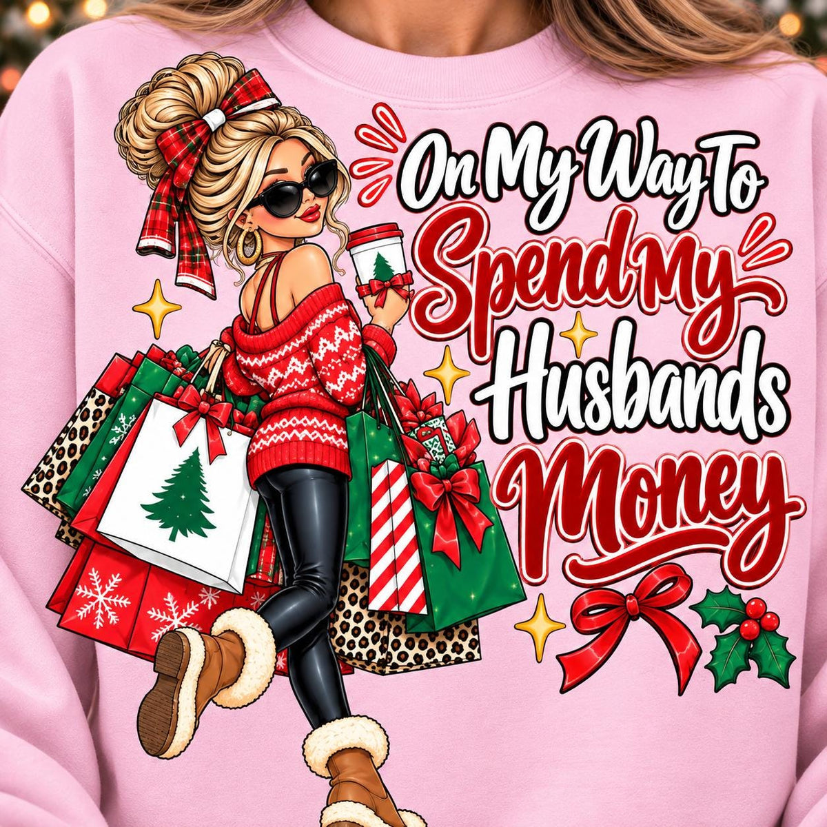 Woman wearing a light pink funny Christmas shopping sweatshirt.