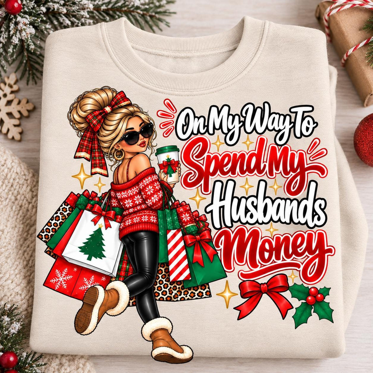 Folded sand funny Christmas shopping sweatshirt with festive graphic.