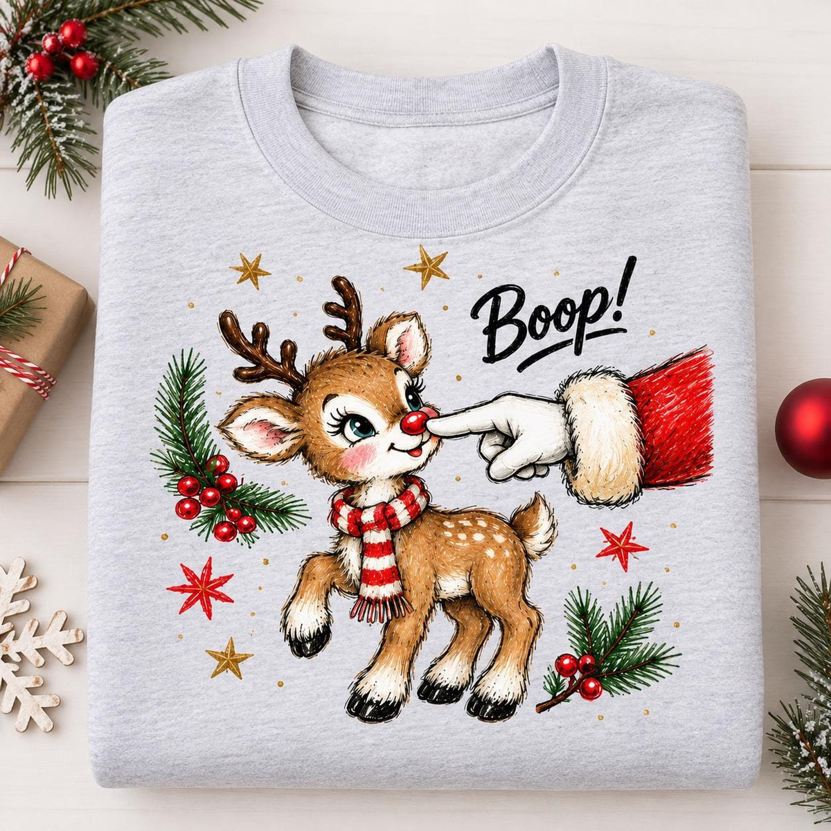 Folded Ash Gray Christmas sweatshirt with Santa and red-nosed reindeer design.