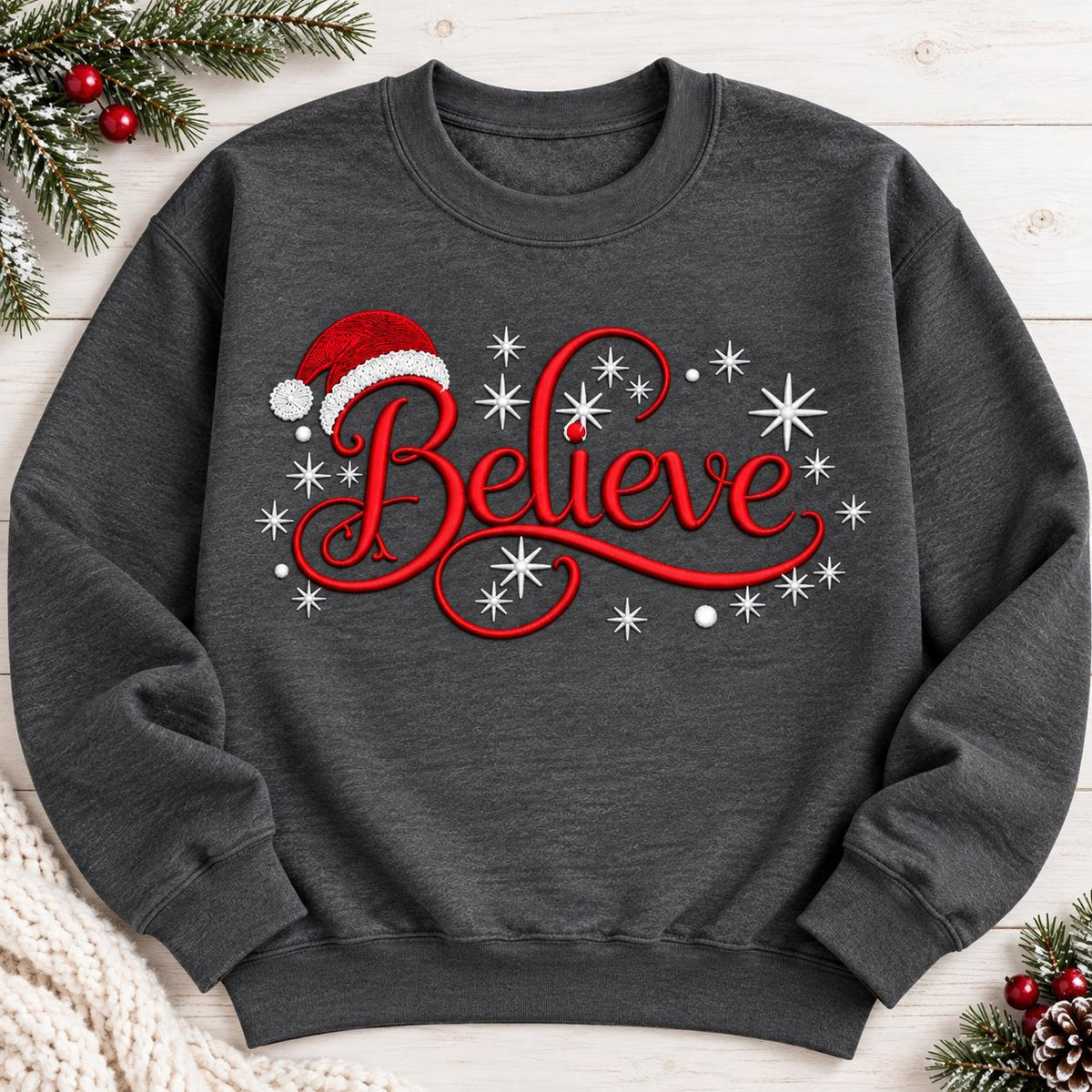 Charcoal Believe Christmas sweatshirt laid flat with red and white holiday design.