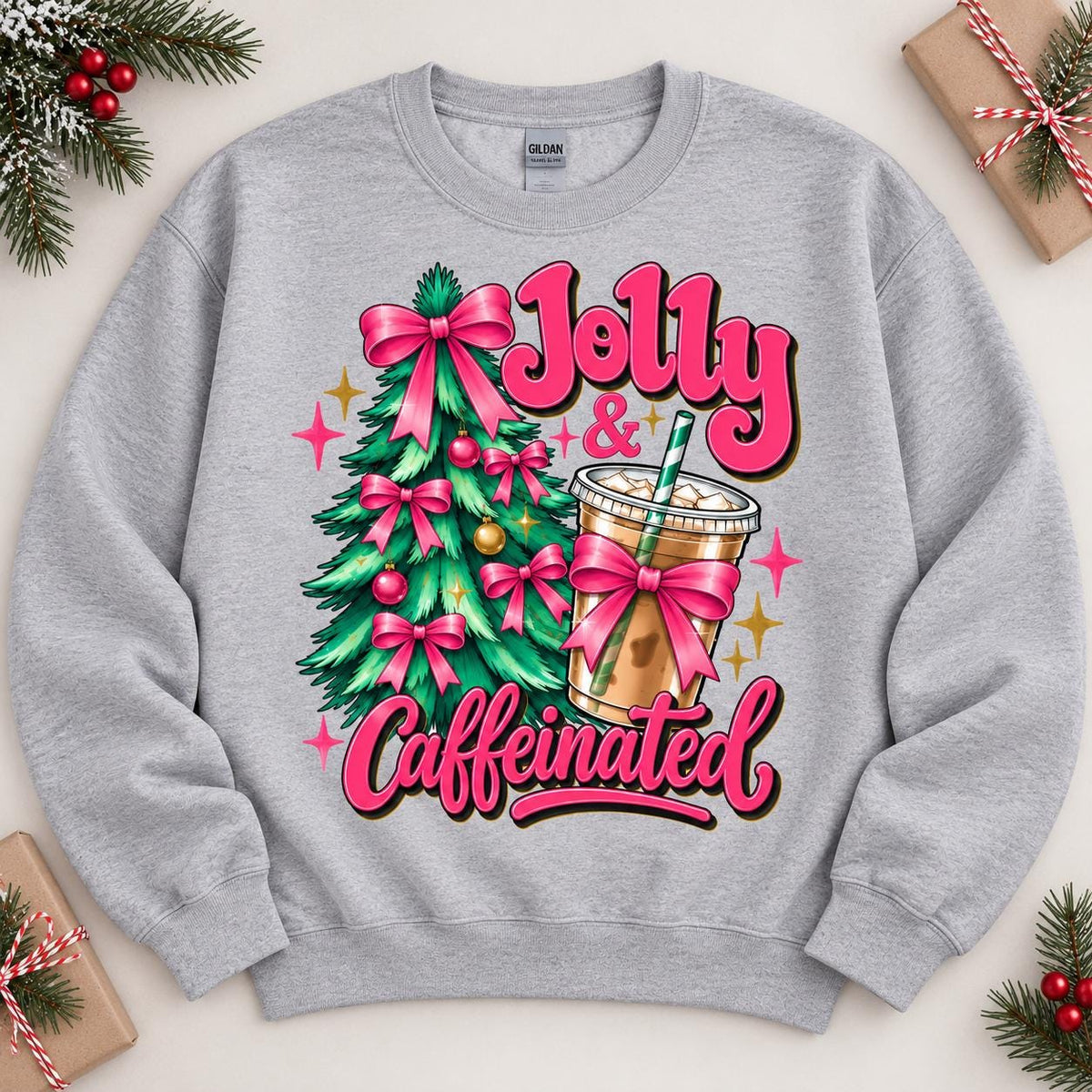 Sport Gray Christmas coffee lover sweatshirt laid flat with holiday greenery.
