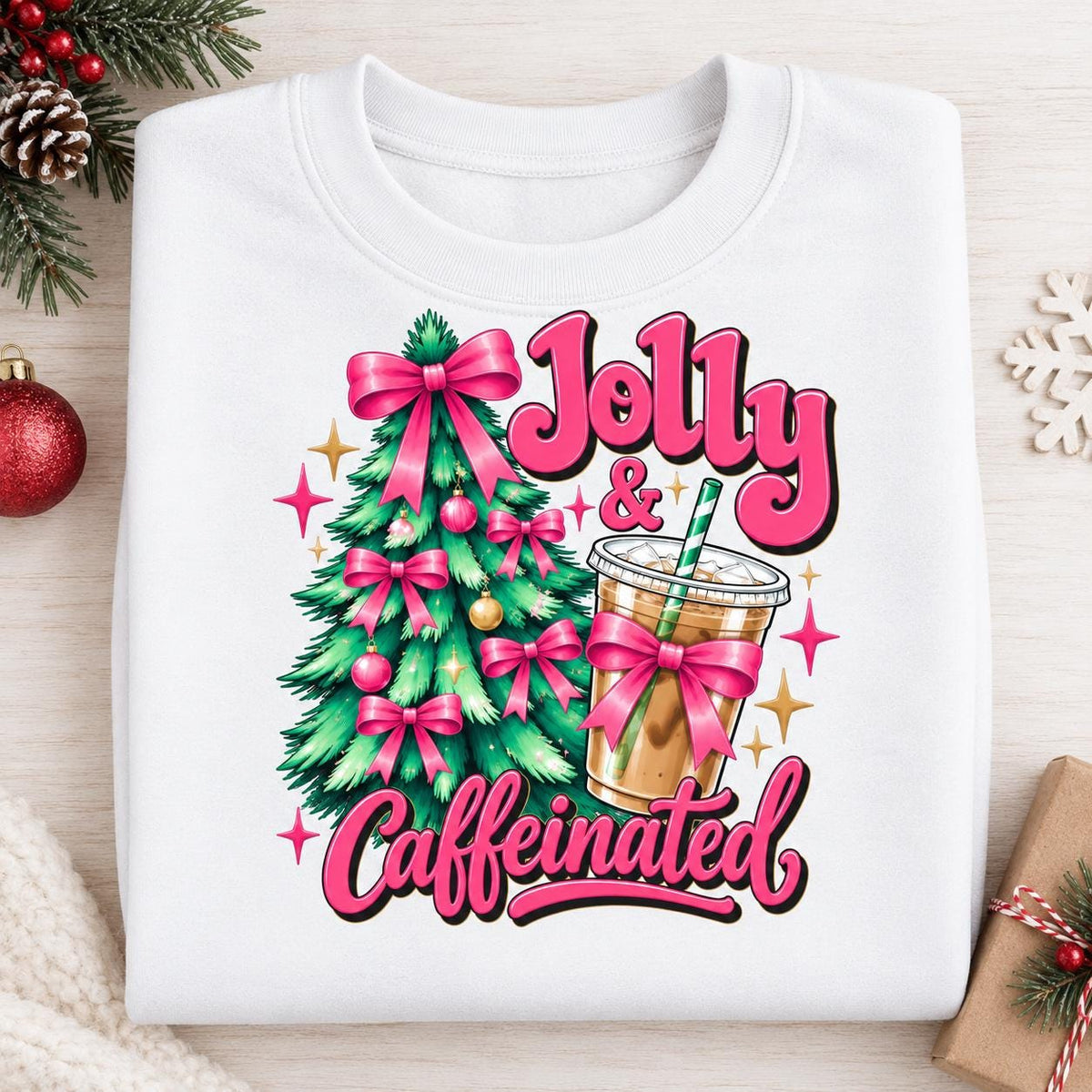 Folded White Christmas coffee sweatshirt with pink bows and iced coffee graphic.