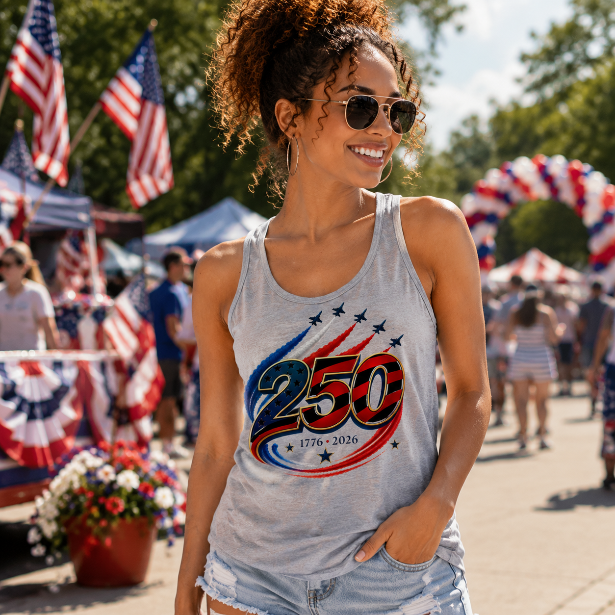 Woman wearing a tank top with a 250th anniversary design at a patriotic event. The Scoobie Shack.